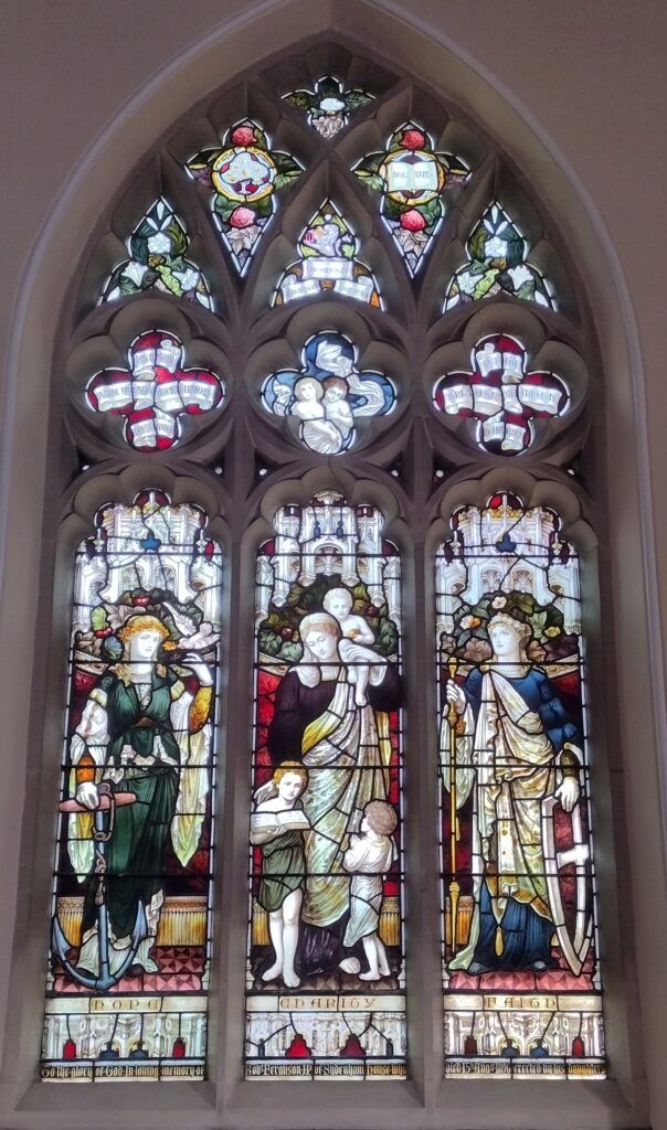 A three-light and tracery window in the North Transept window of Belmont Presbyterian Church